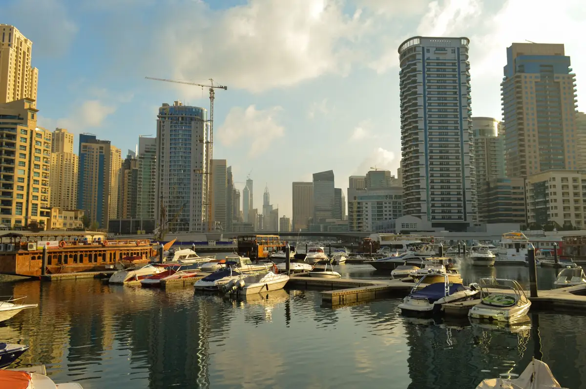 Yacht crew preparing a charter yacht in Dubai Harbour
